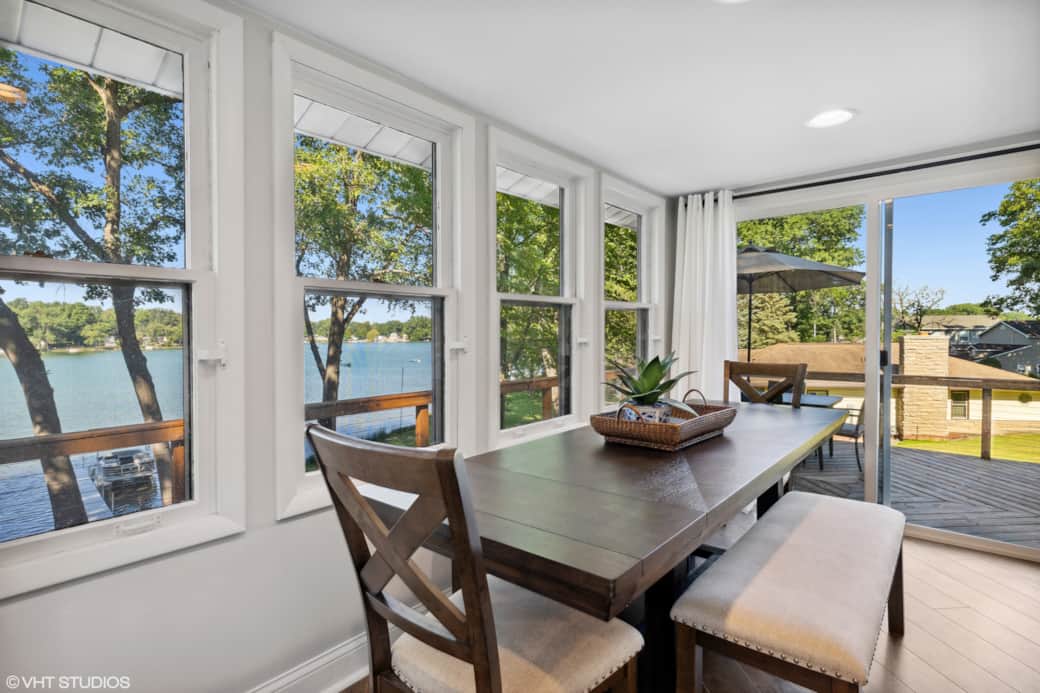 Dining Area With Views Of Lake And Easy Access To Deck