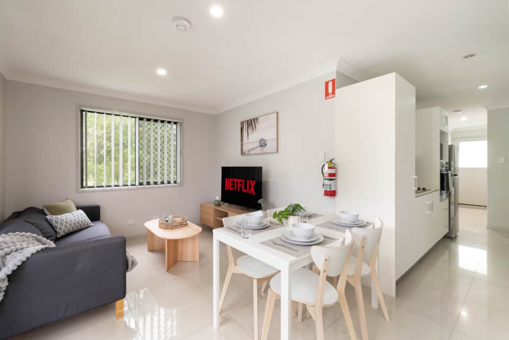 Dining Area: Integrated dining area within open living layout