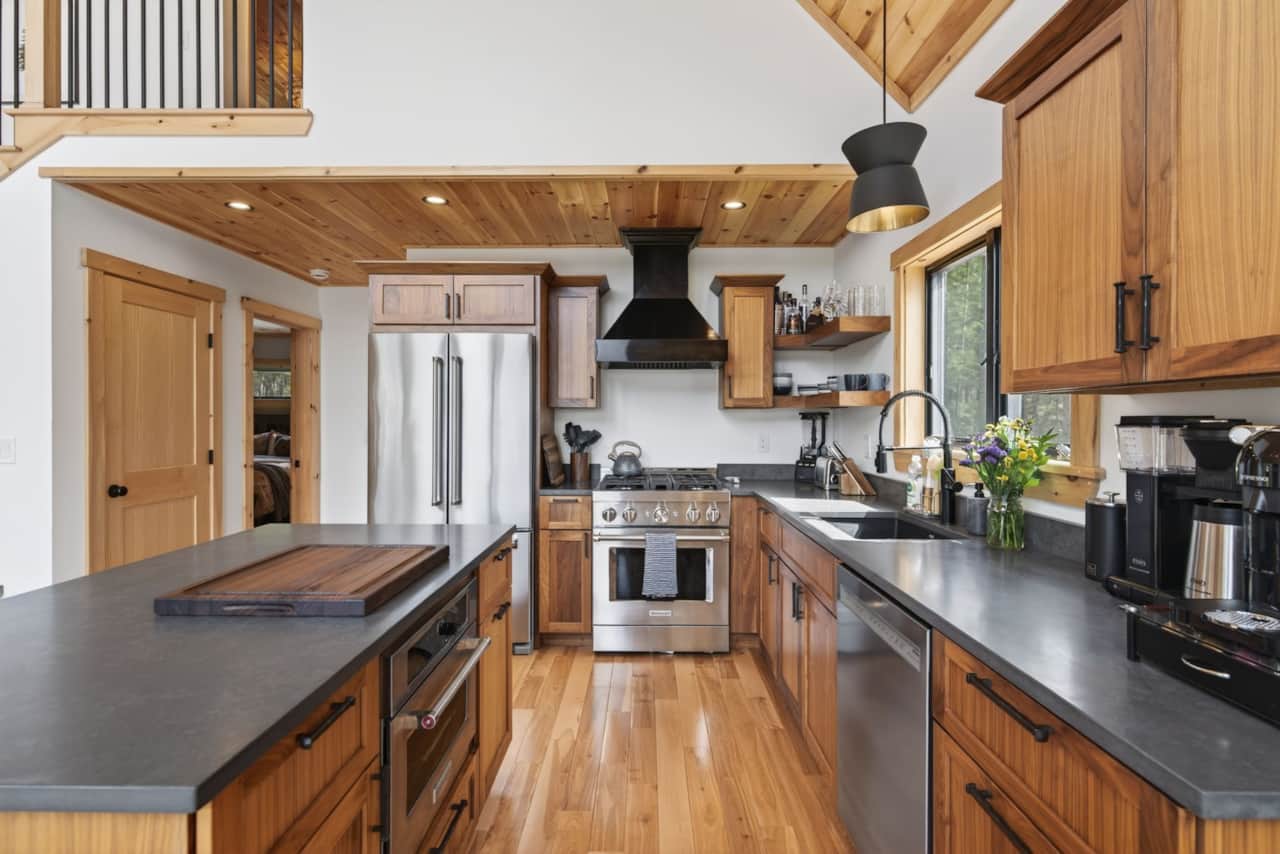 Fully equipped kitchen with generous counter space and modern appliances