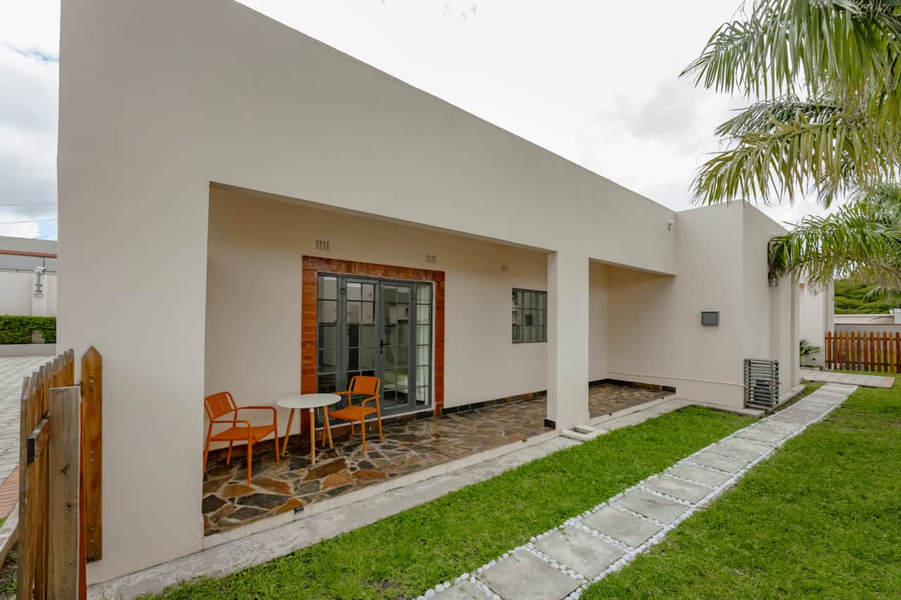 Private patio seating outside the unit