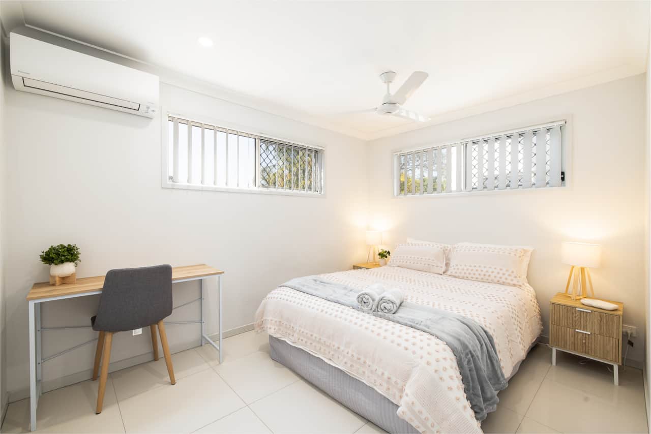 Bedroom: Peaceful bedroom with cozy design and ample storage 