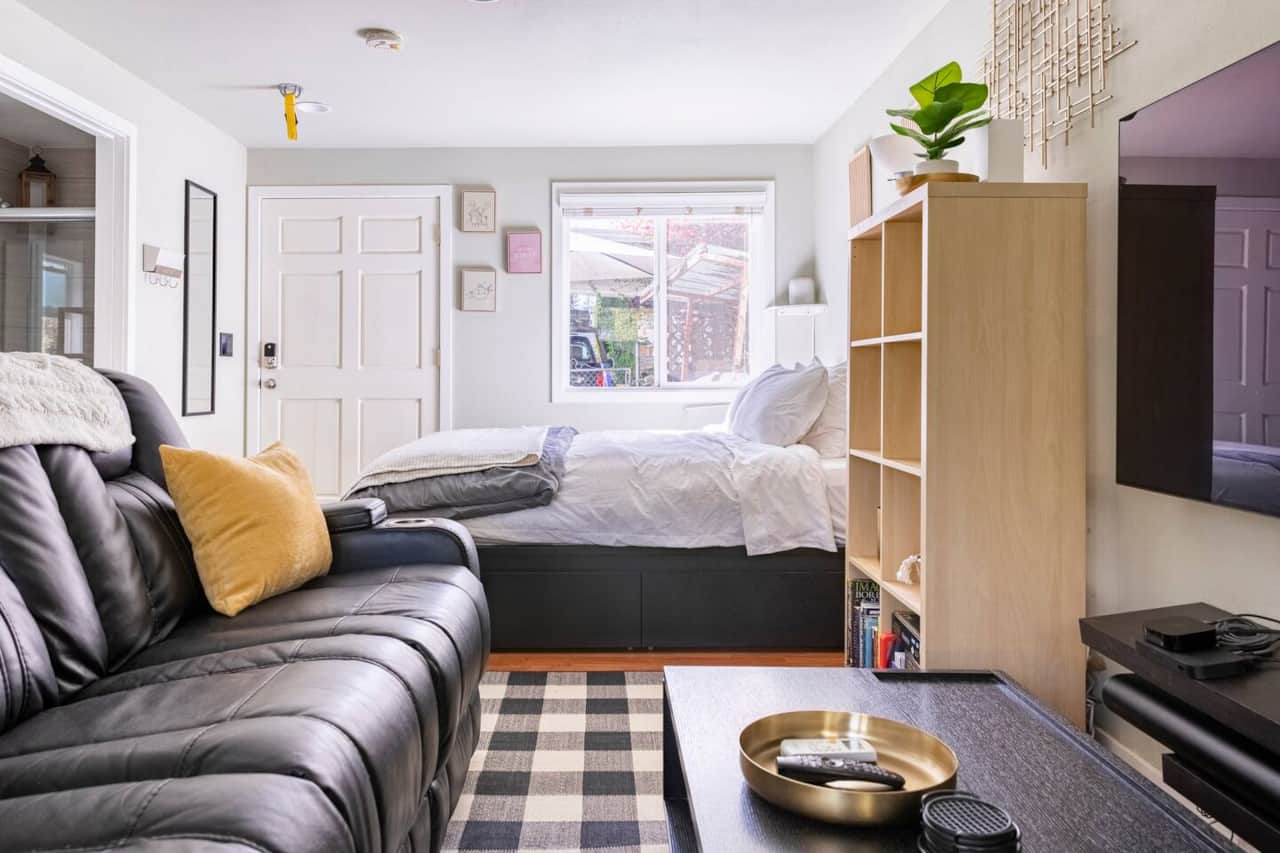 Open layout with bed, kitchen, and living space designed for seamless comfort