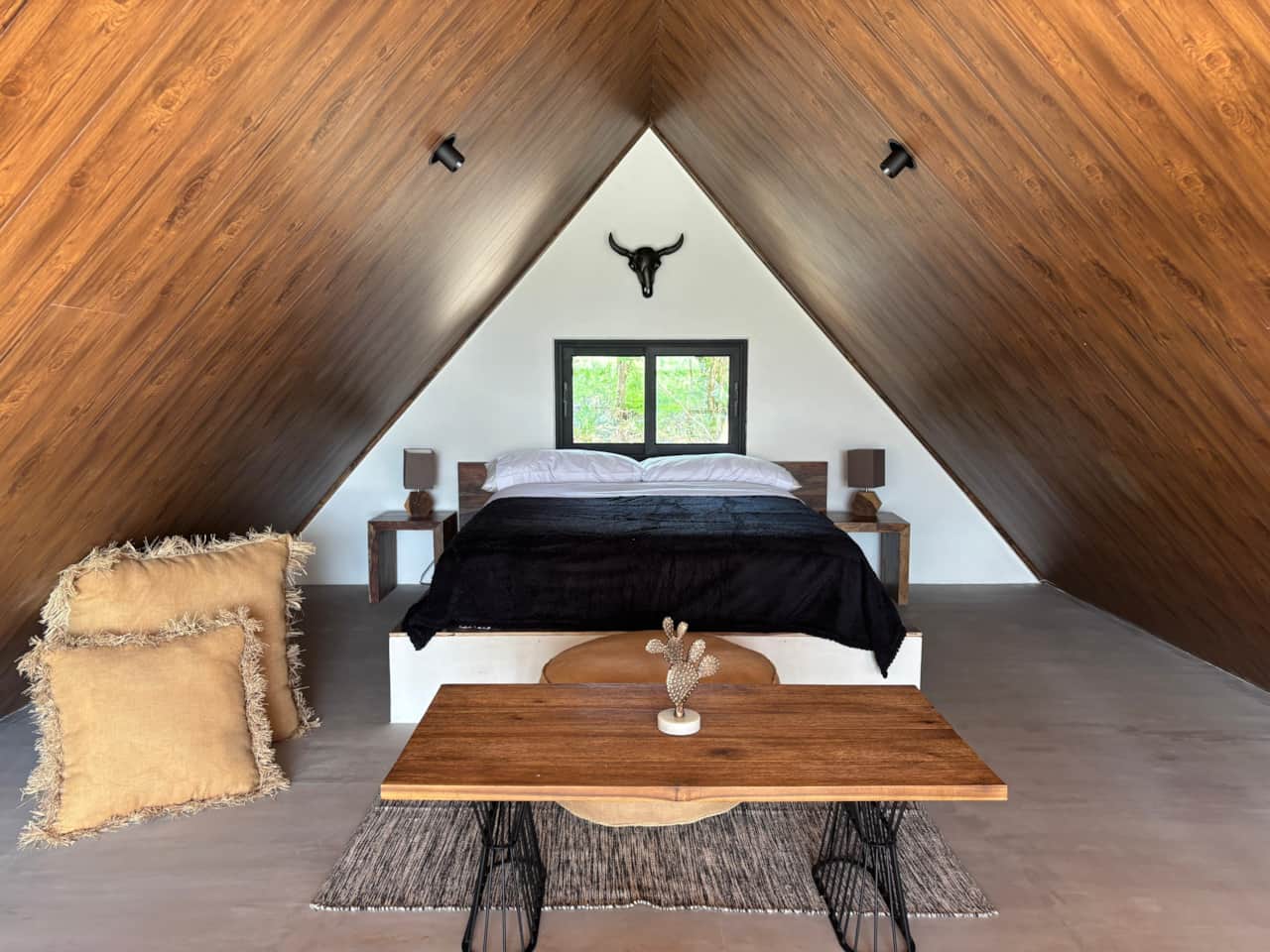 Sleep under a stunning A-frame wooden roof in this cozy eco cabin Valle de Anton Panama.