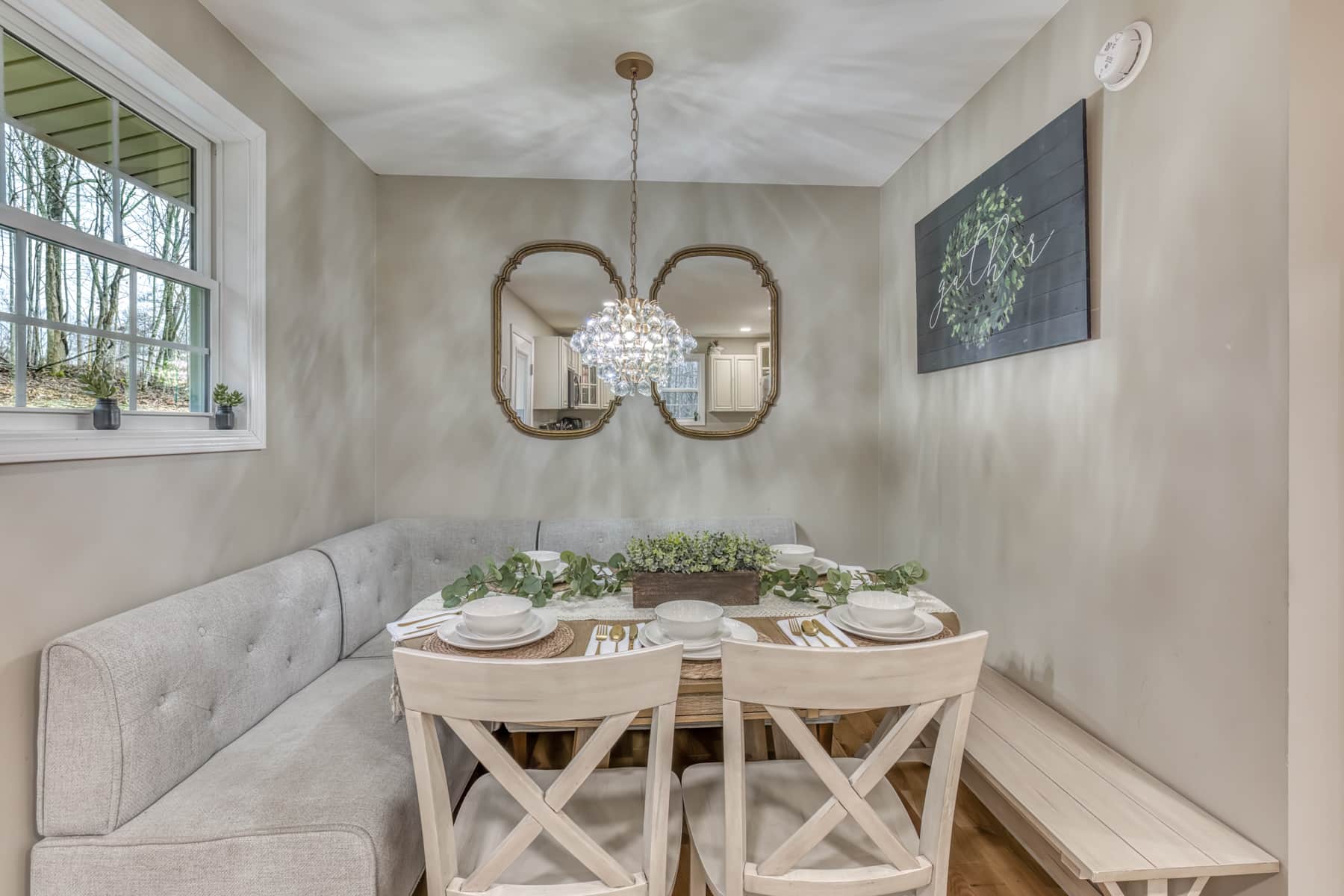 Open dining area with comfortable bench seating and table for family meals.