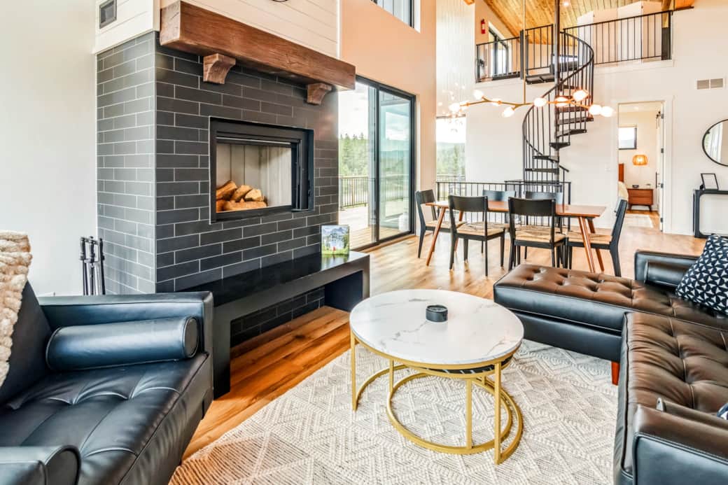 Enjoy the fireplace & views from our comfy vegan leather sofas. Enjoy the fireplace & views from our comfy vegan leather sofas.
