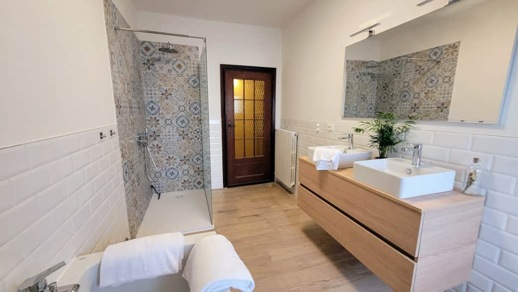 Bathroom with walk-in shower and bathtub