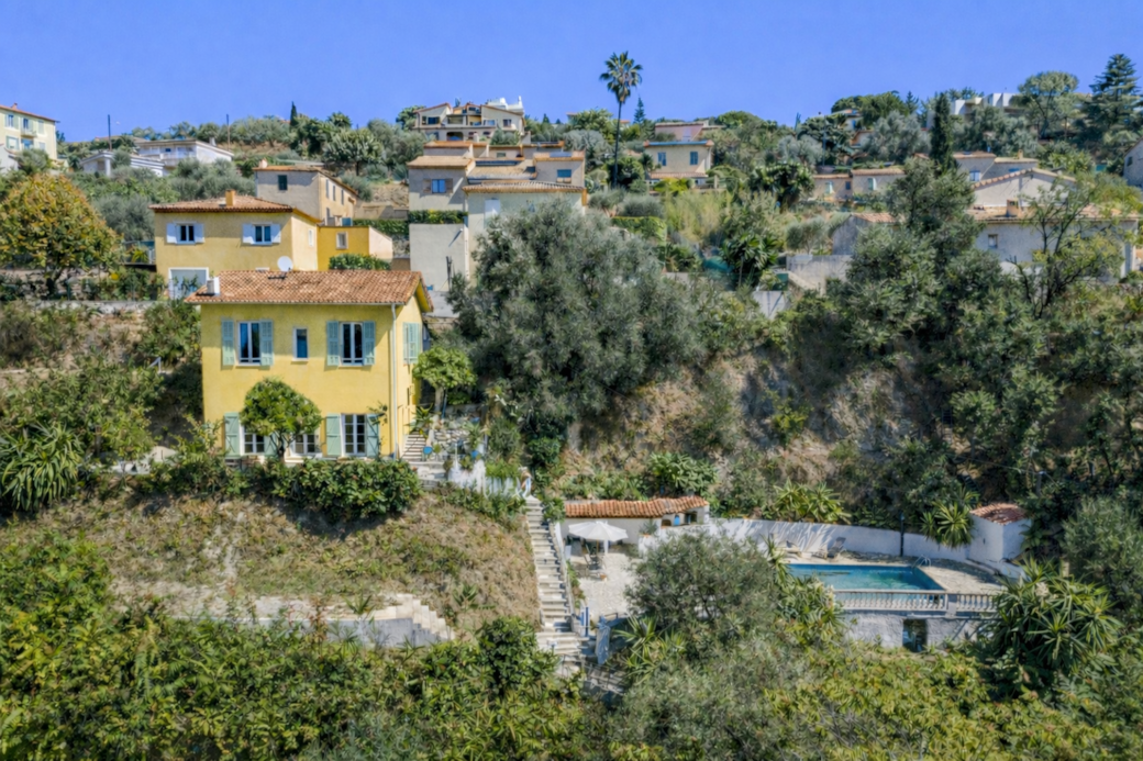 Mediterranean hillside village with pool
