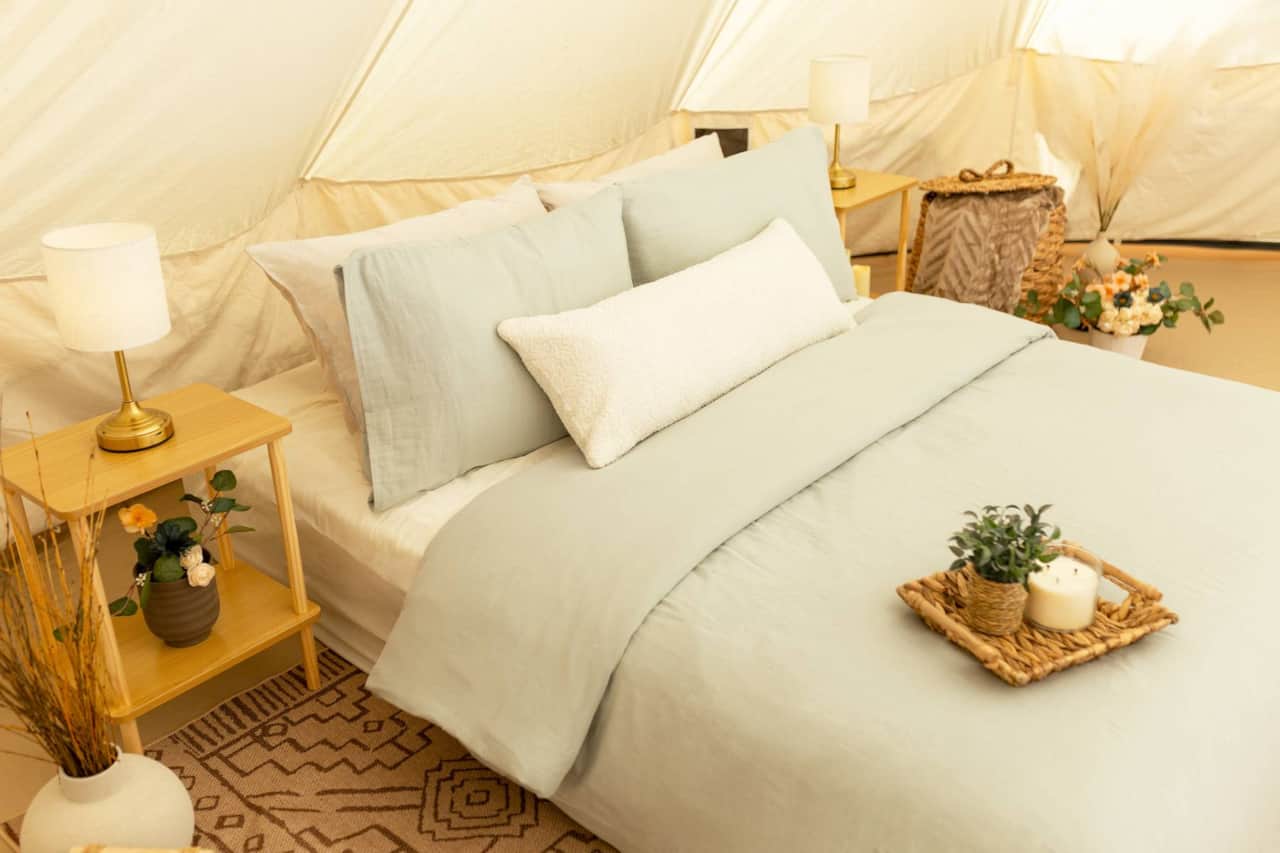 Thoughtful Bedside Comforts and Calming Natural Details