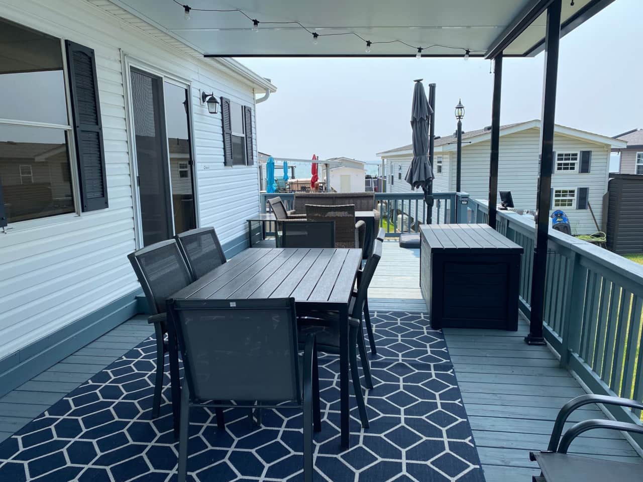 Large covered deck with lake view