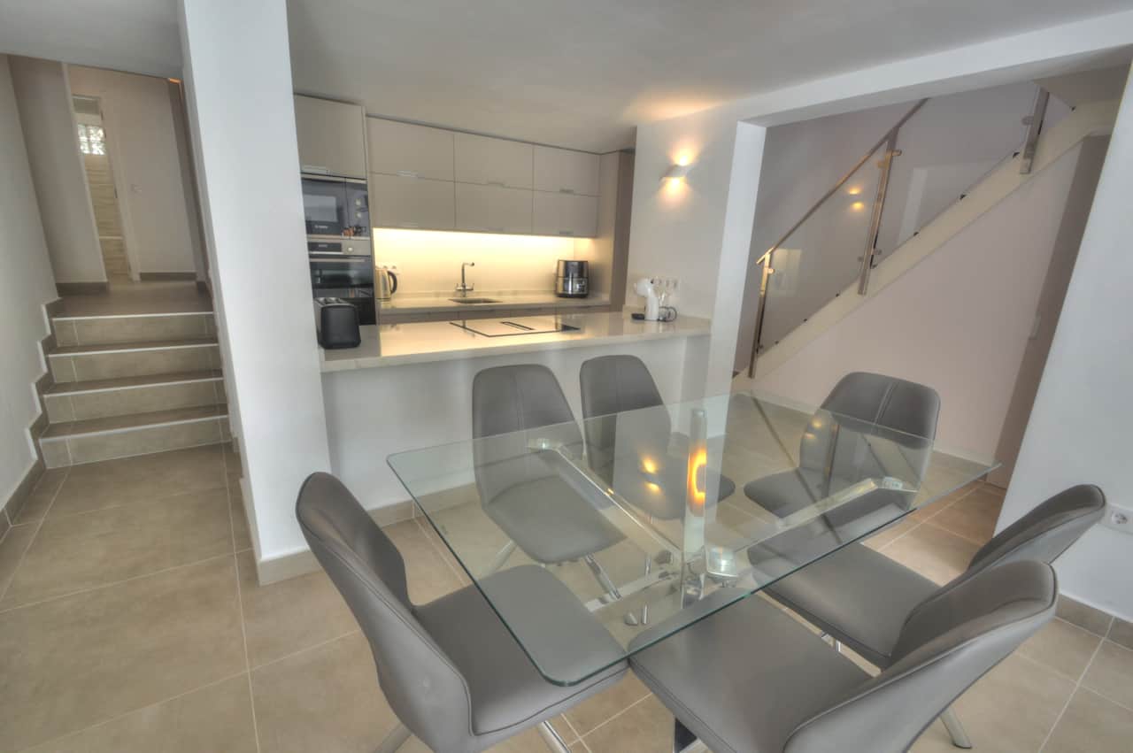 Open space kitchen with table and chairs