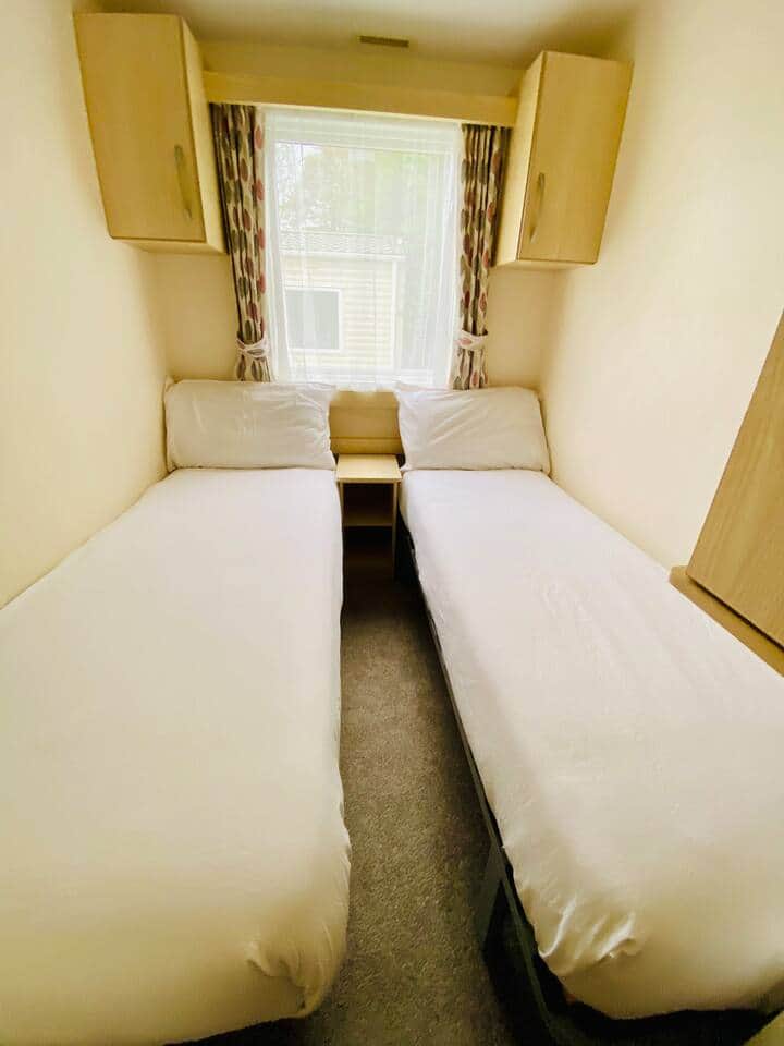 twin bedroom with wardrobe 