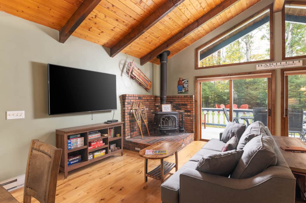 Despite the open concept, the living area has plenty of separate spaces for various activities.