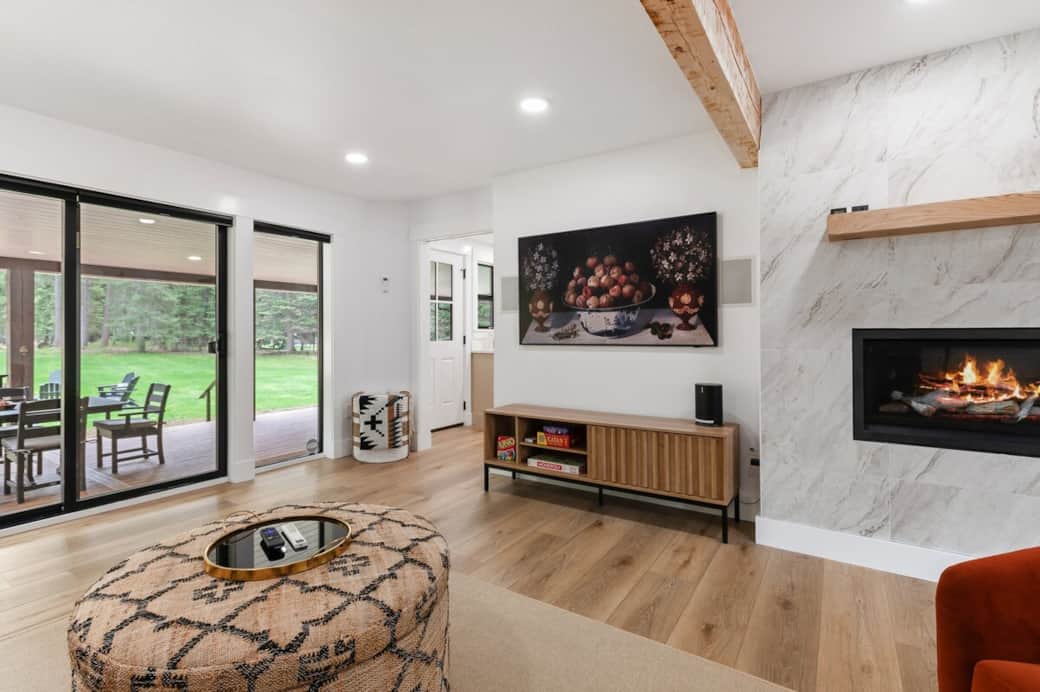 Captivating view of the outdoors bringing in natural light. The Samsung Frame 65-inch TV with Sonos subwoofer, Sonos "Move" portable Bluetooth speaker, games, and reading books to keep you entertained. 