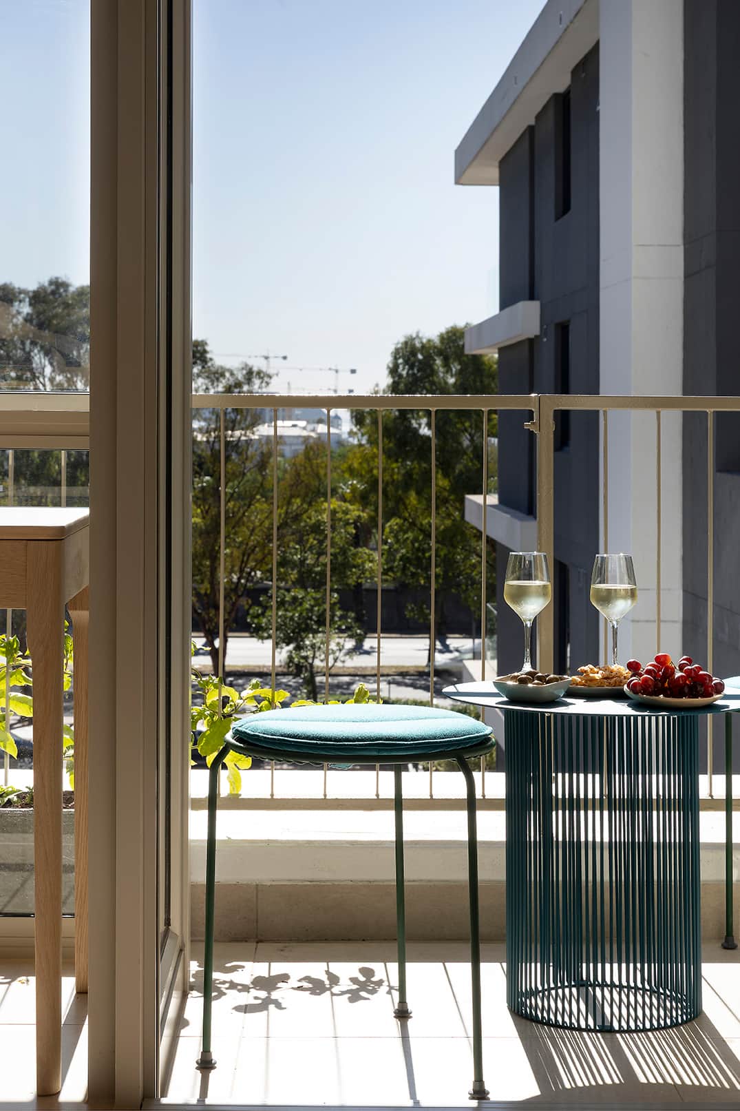 Small balcony with Haldane Martin seating