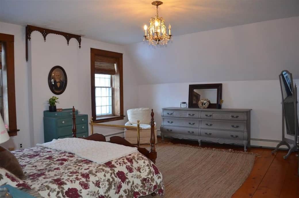 The upstairs master includes a queen beed with plenty of light. 