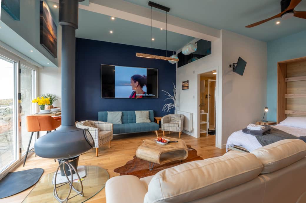 Smart TV and cozy corner seating area Smart TV and cozy corner seating area