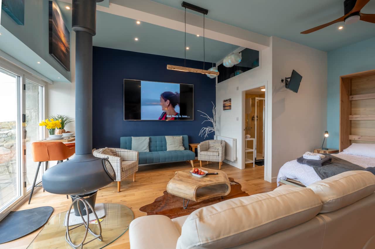Smart TV and cozy corner seating area