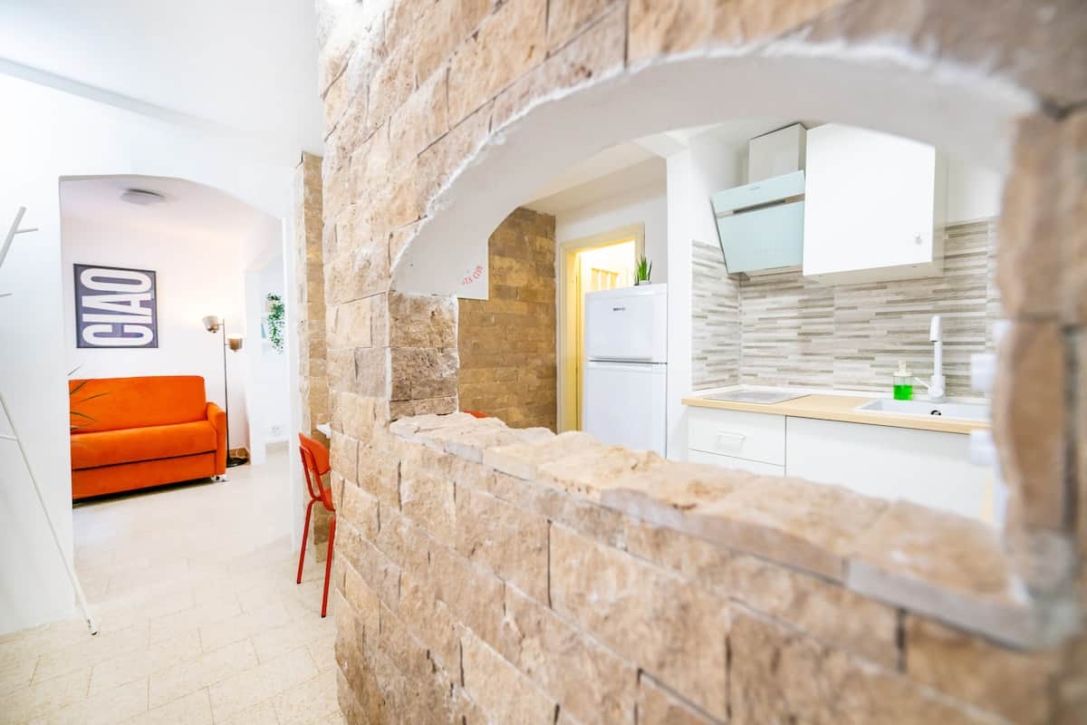 Ingresso accogliente con muro di pietra per rendere caloroso il vostro soggiorno!