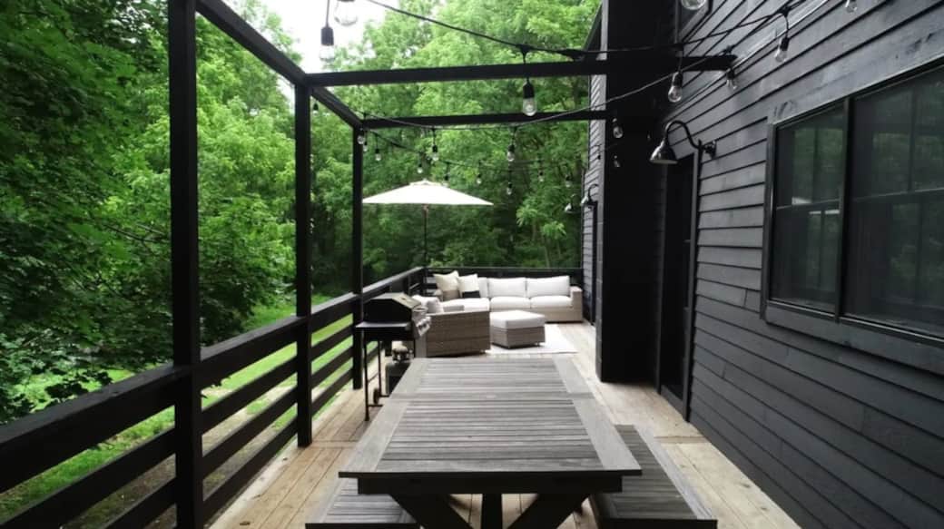 Back deck with propane grill, dining table and outdoor lounge area with views over the creek. Back deck with propane grill, dining table and outdoor lounge area with views over the creek.