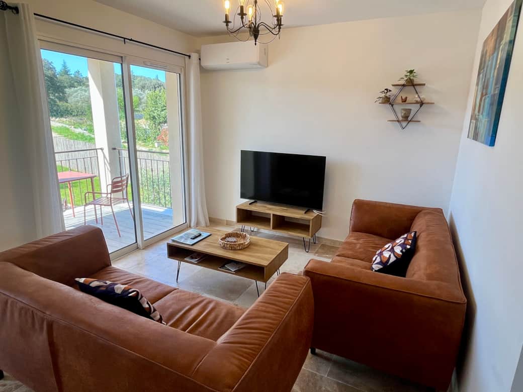 Le salon avec accès au balcon Le salon avec accès au balcon