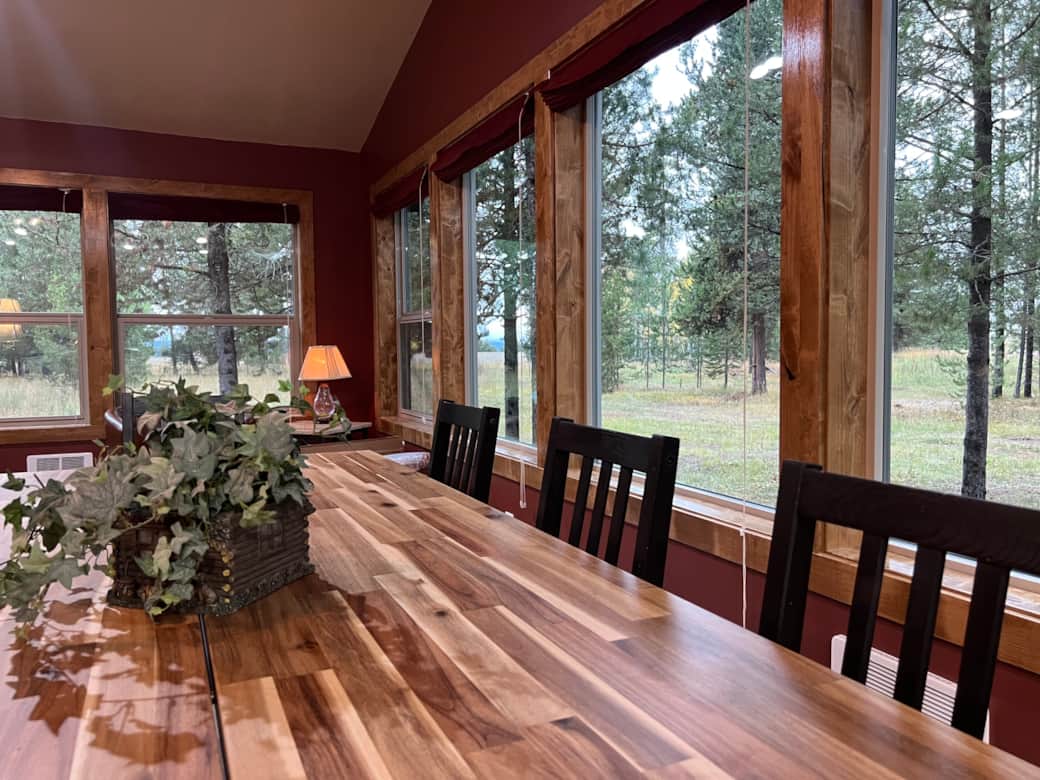 Dining table for 8 with an amazing view. Perfect for gathering the family for games, or even work. Dining table for 8 with an amazing view. Perfect for gathering the family for games, or even work.
