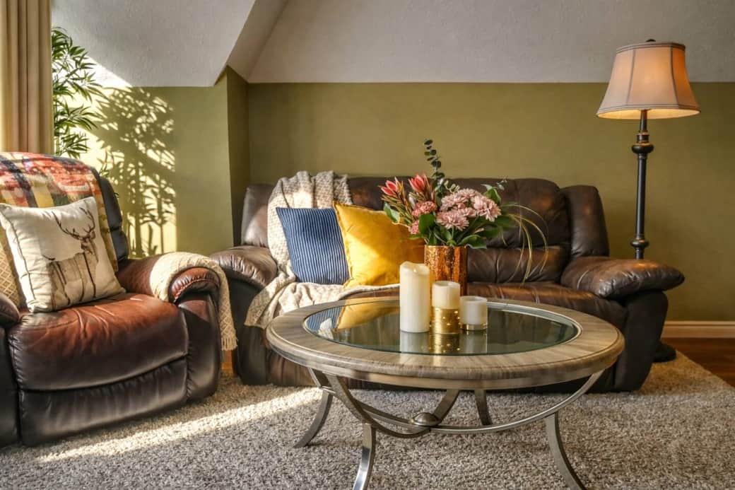 Cozy up by the fireplace and enjoy the mountain views from the living room.
