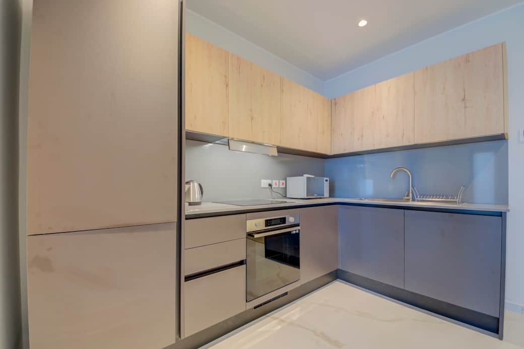 The fully equipped kitchen with spacious countertops is ready for your MasterChef skills The fully equipped kitchen with spacious countertops is ready for your MasterChef skills