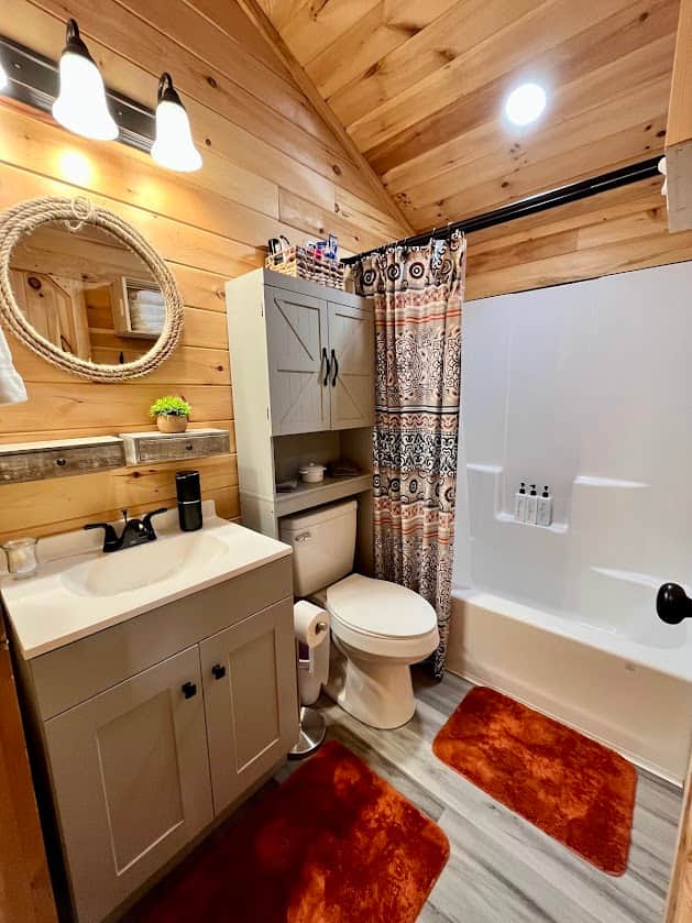 Main bathroom just off the living space and next to second bedroom.