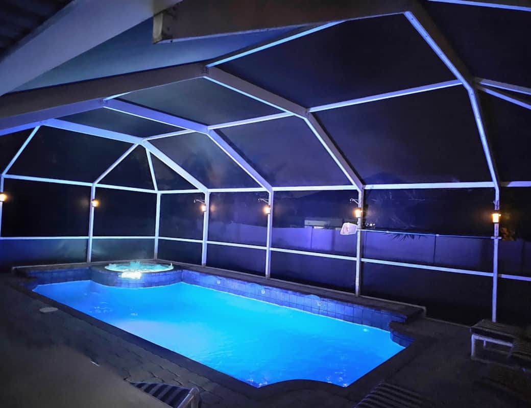 Enjoy evenings in well lit pool area complete with a hot tub. Enjoy evenings in well lit pool area complete with a hot tub.