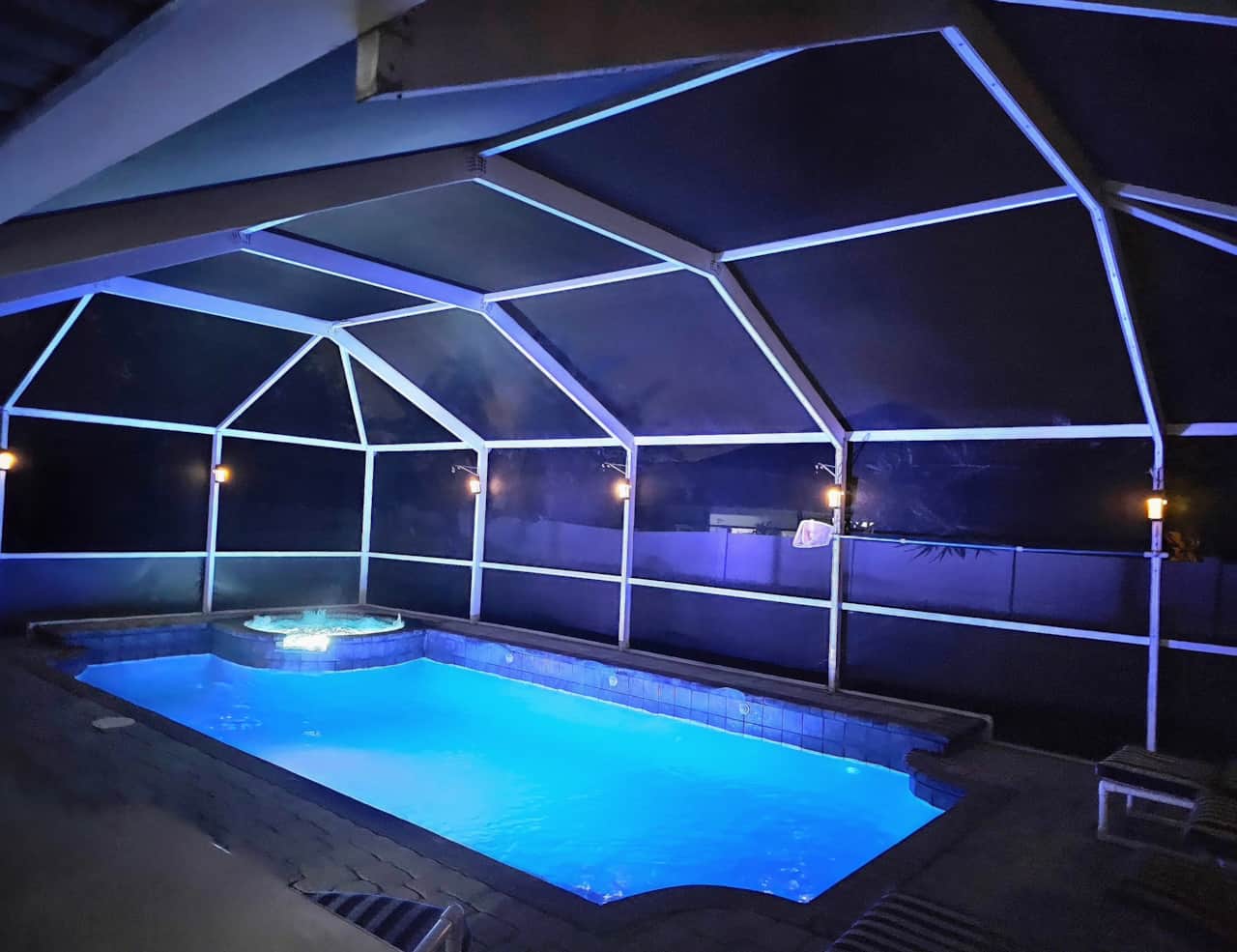 Enjoy evenings in well lit pool area complete with a hot tub. 
