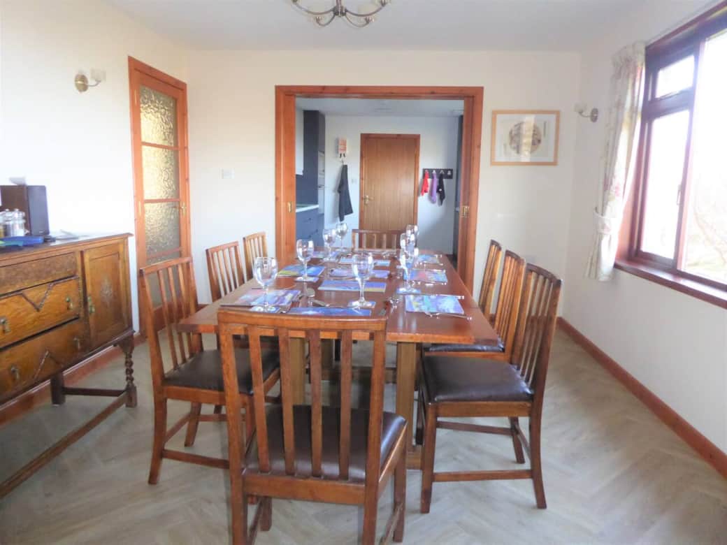 Dining room with kitchen beyond