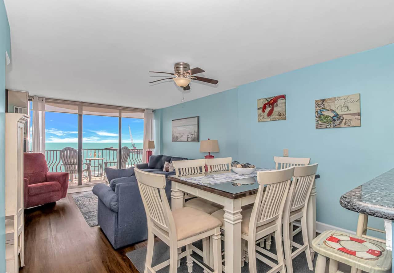 Gather around the dining table for family dinners or game night with Ocean views!