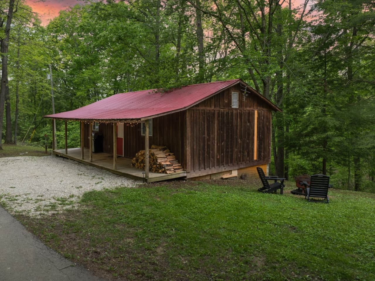 Wooded cabin with red roof near Cave Run Lake, Kentucky