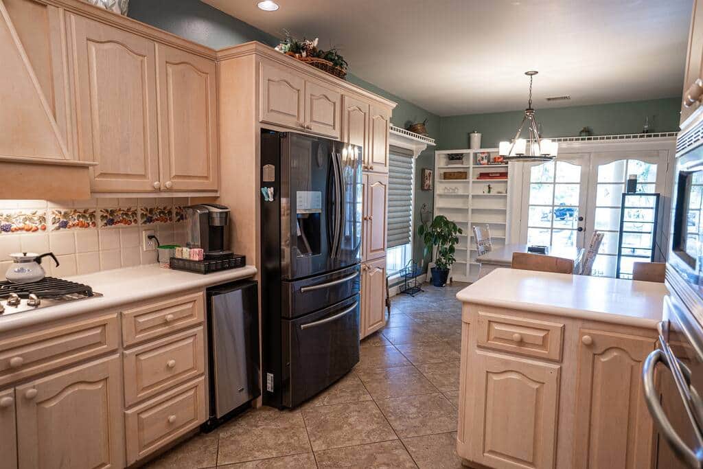 Kitchen is stocked with spices, oils, flour and sugar