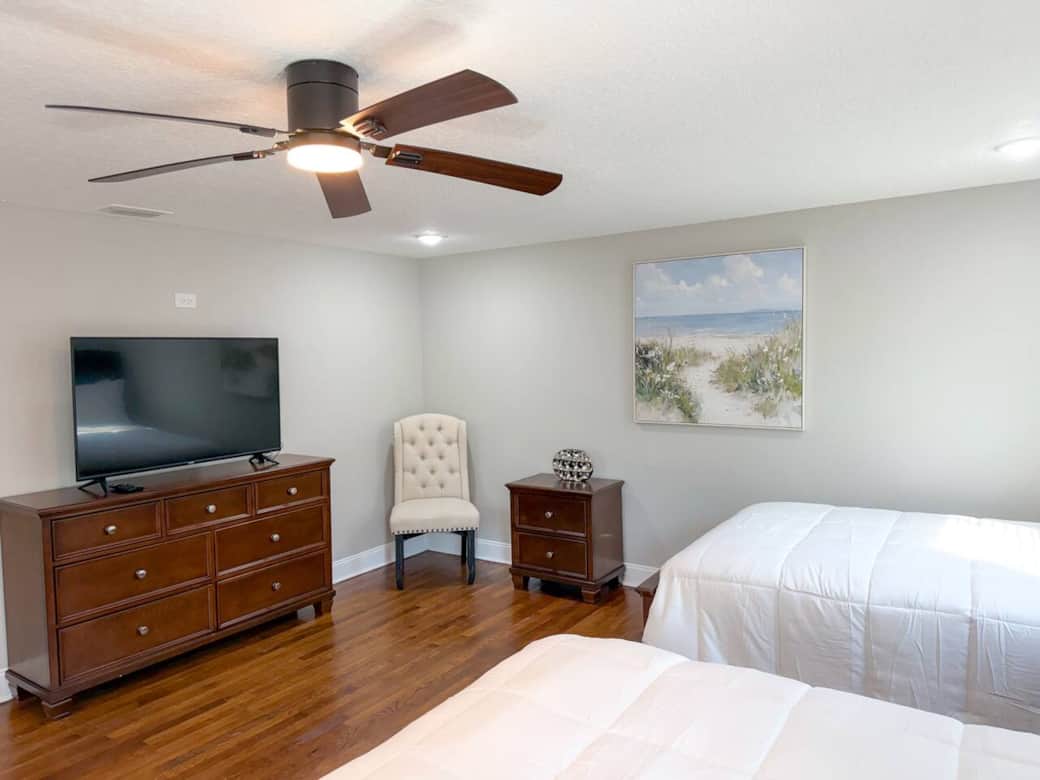 Mia Room - This spacious bedroom features 3 full-size beds, a walk-in closet, and a smart TV.