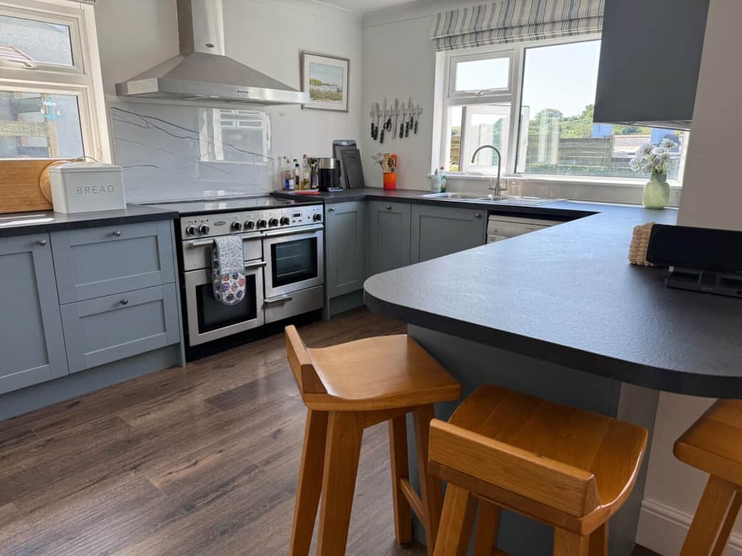 Perfect kitchen for keen cooks. Double ovens and induction hob. Or relax at the bar and oversee the workers.  