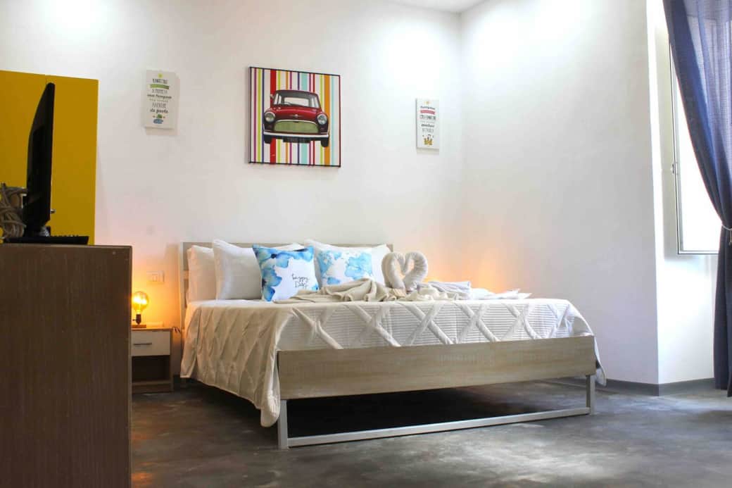 Sleep like a royal family member on the queen-size bed in the bedroom.