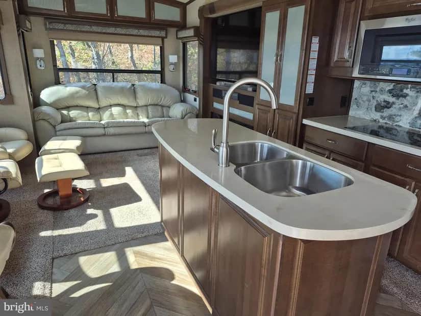 Kitchen and living area Kitchen and living area