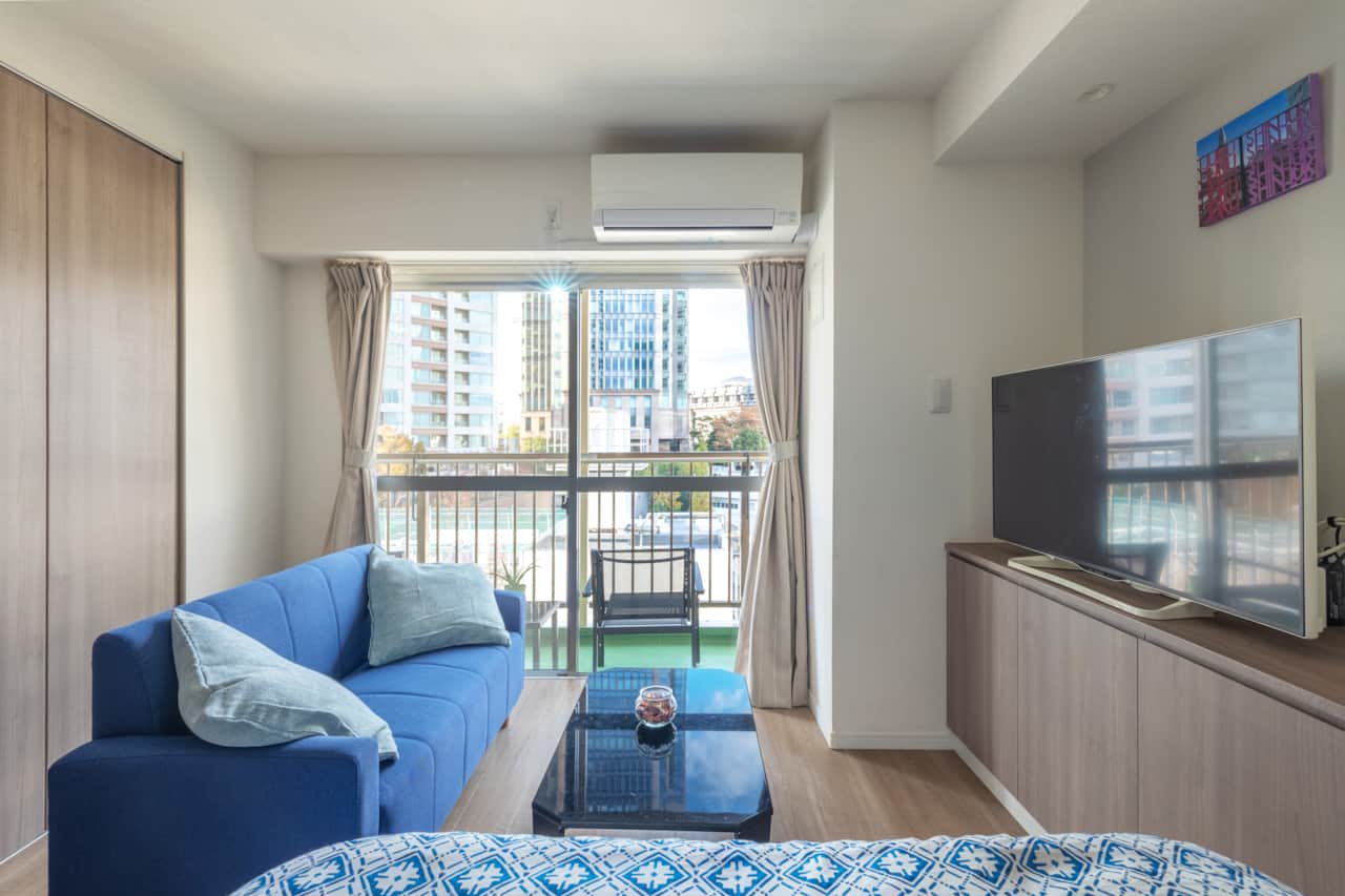 Relax in a cosy lounge area bathed in natural light and skyline vistas