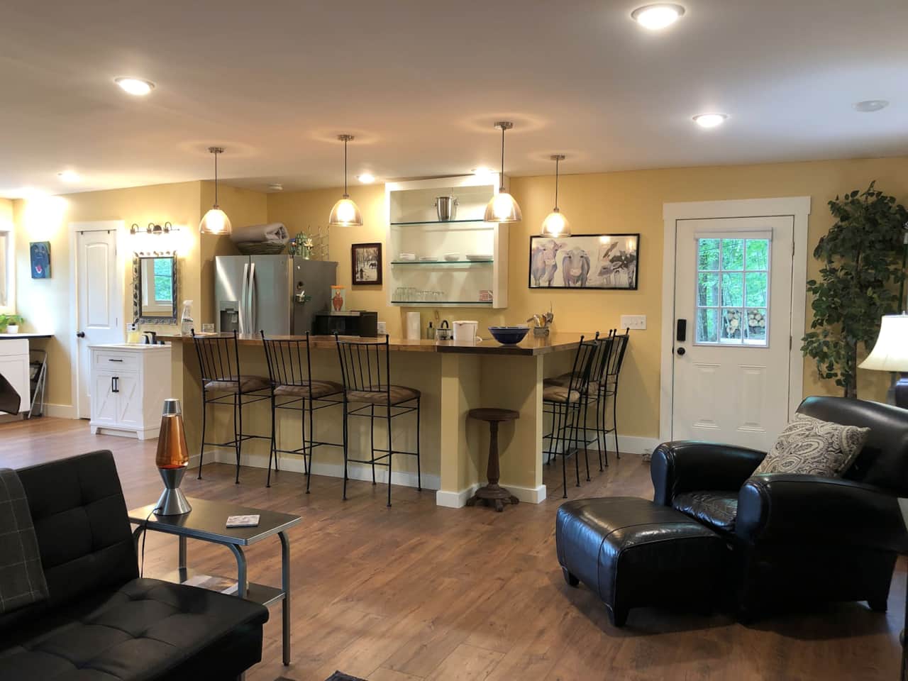 Efficiency kitchen with induction stove top, microwave convection oven, fridge and coffee pot