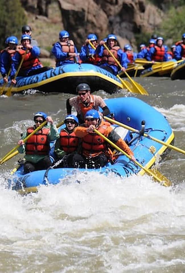 Whitewater rafting through spring rapids on a Colorado river