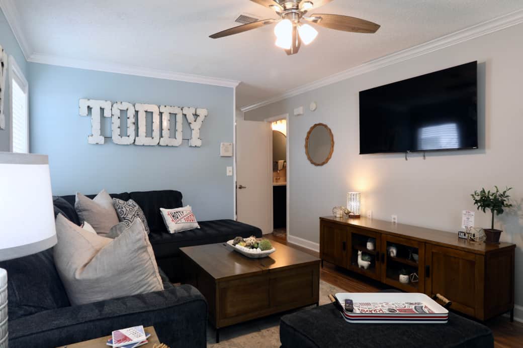 Living Room with open door to half bath
