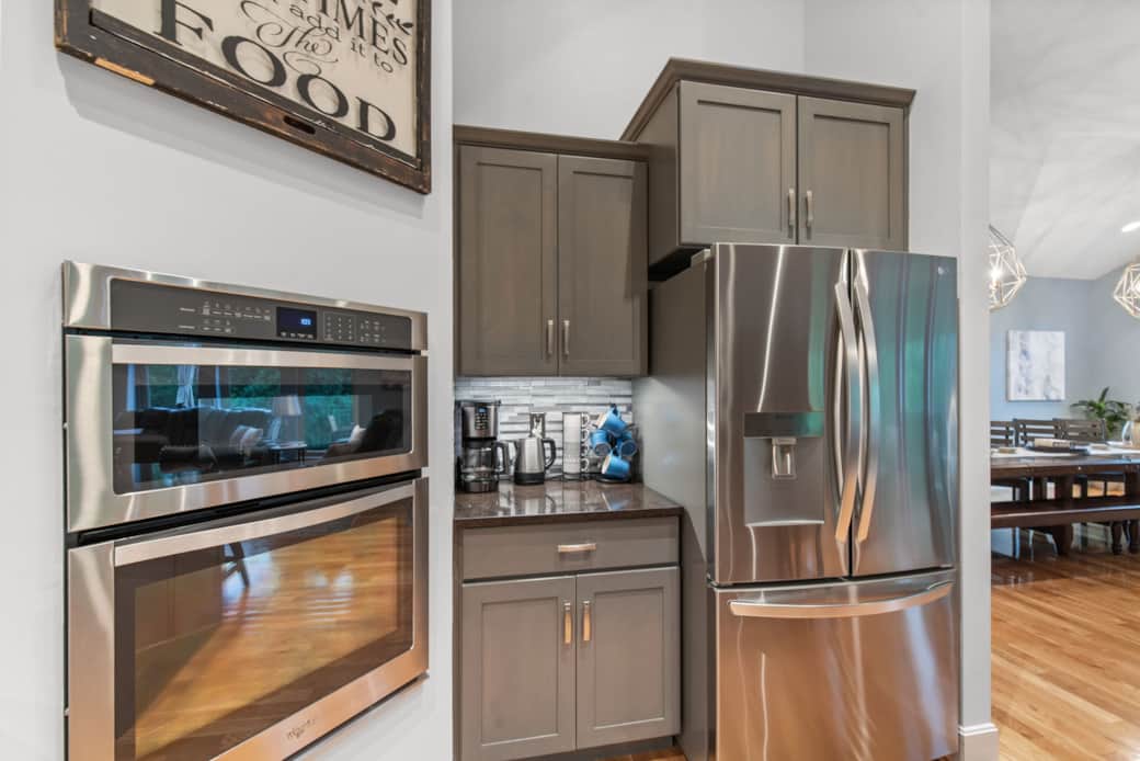 The appliances are stainless steel. The fridge has filtered water, and the freezer has an ice maker.