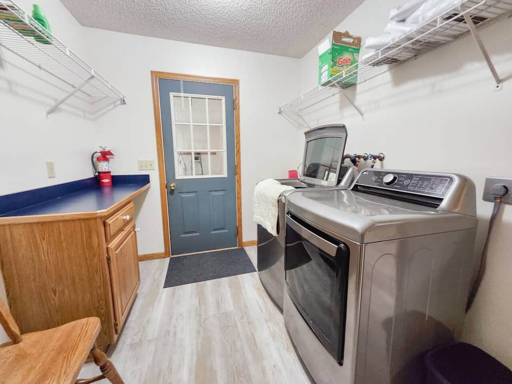 The laundry/mud room is the entrance to the home from the garage. Mega capacity washer and dryer are included.