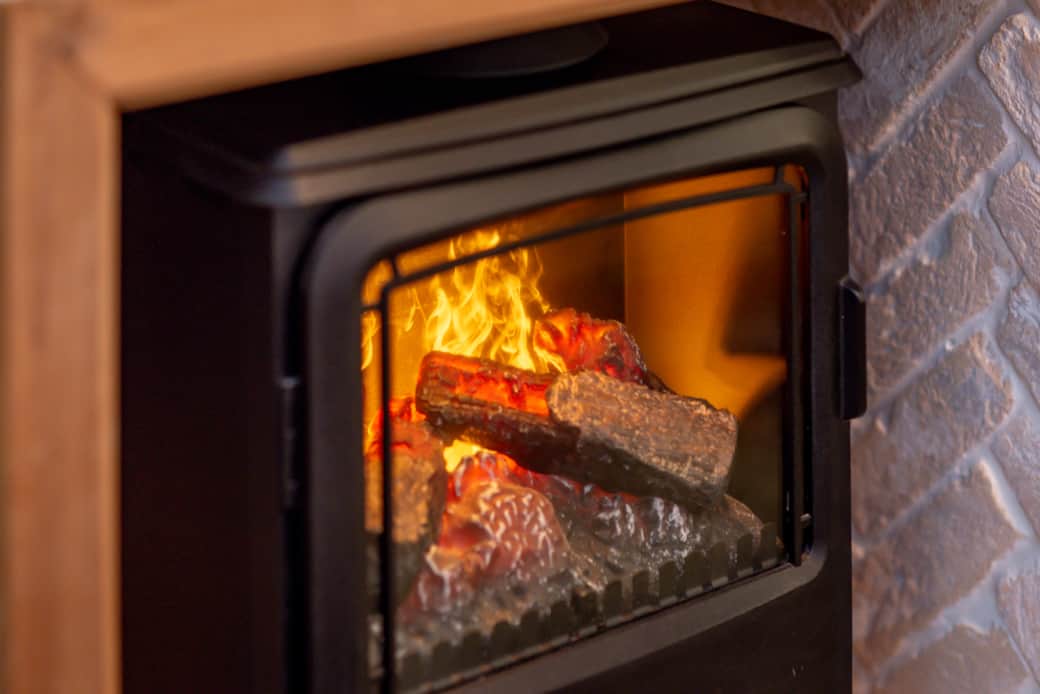 Electric Fireplace in Main Bedroom