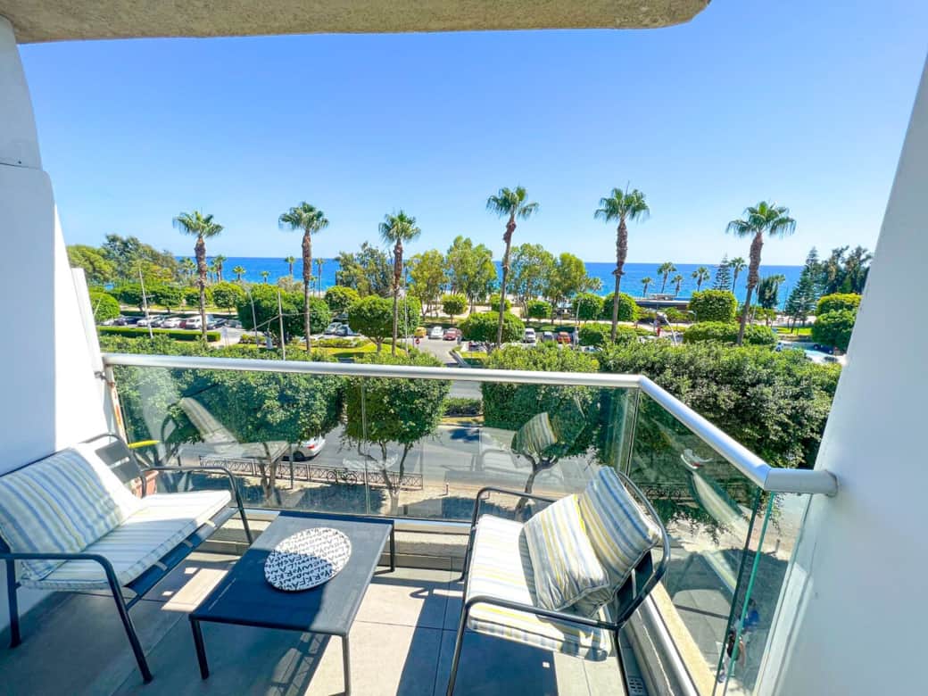 Enjoy reading a book from our stunning balcony overlooking the Mediterranean sea