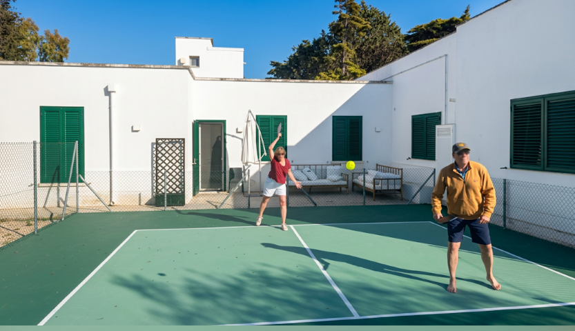 Guests playing tennis