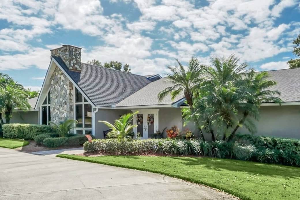 The circle driveway in front of the house offers ample parking for you and your guests.  Pull up to the front of the entrance with ease, as this design ensures easy access and departure.