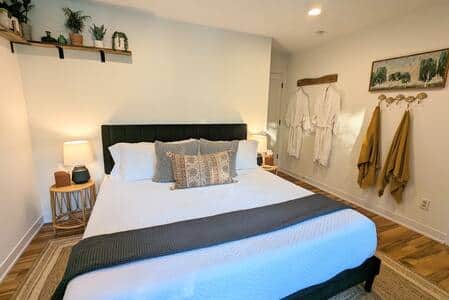 The Emerald Bedroom - King bed with Tuft & Needle mattress and sound machine, use of two robes, 55" 