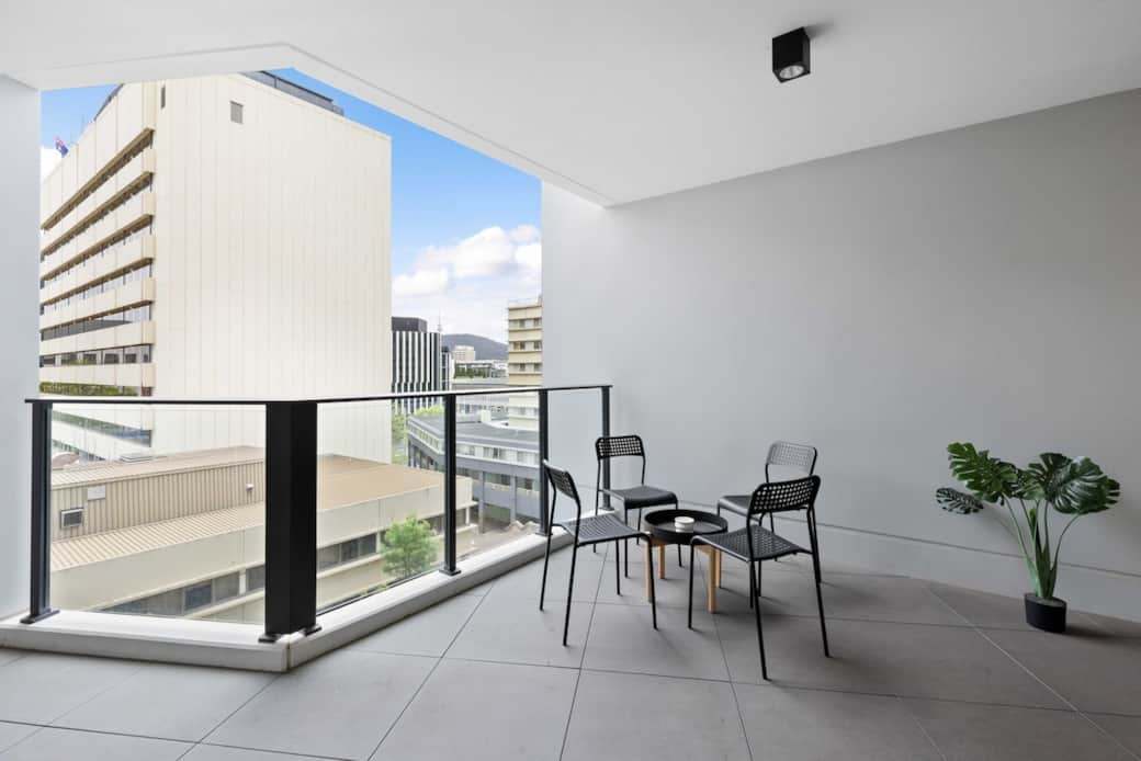 Enjoy the tranquility of our spacious balcony, perfect for morning coffee or evening relaxation. The modern outdoor furniture and scenic views create an inviting atmosphere. This is an ideal spot to unwind and take in the beauty of the surroundings.